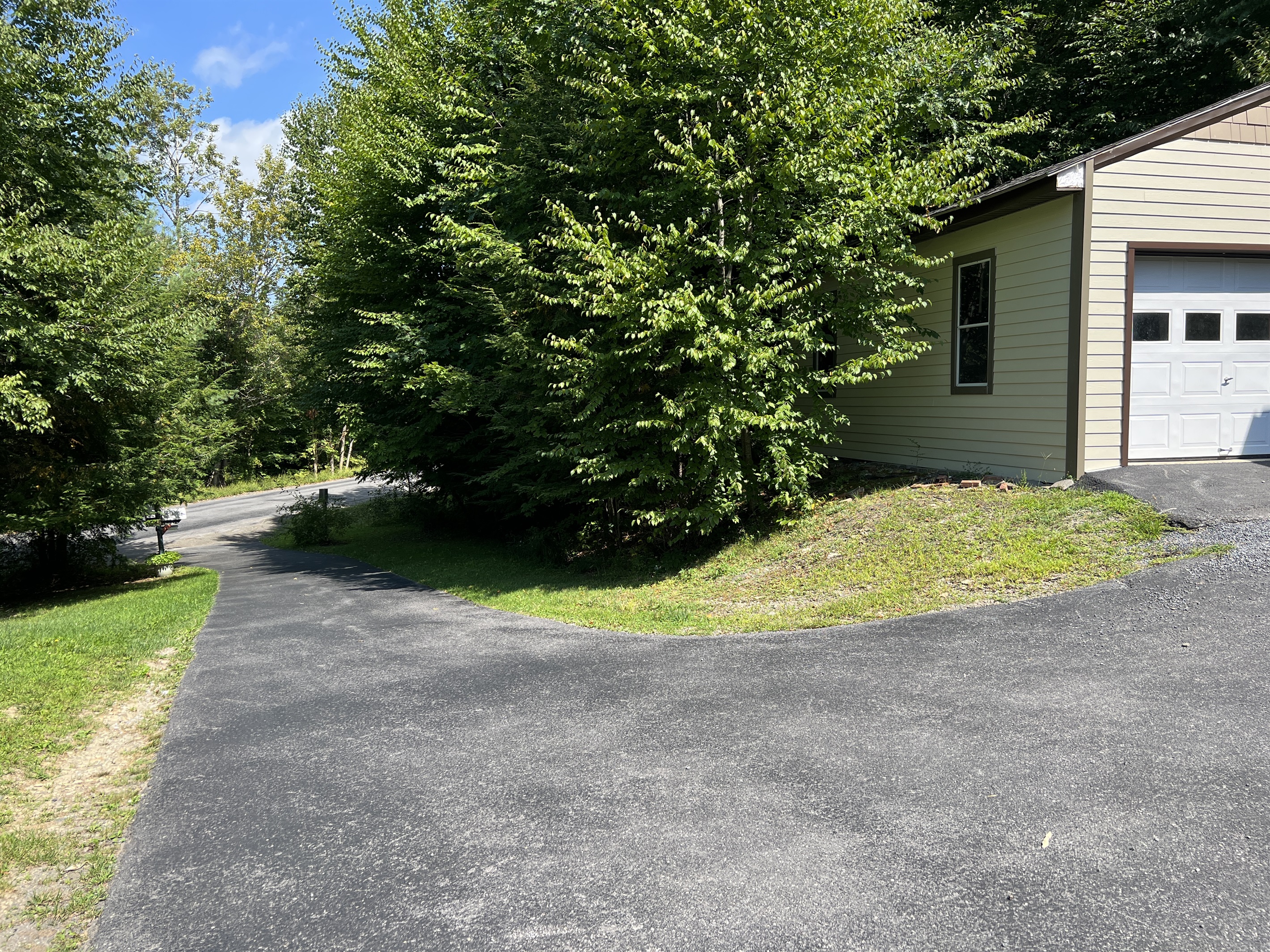 Driveway and parking area for DHM unit 1.