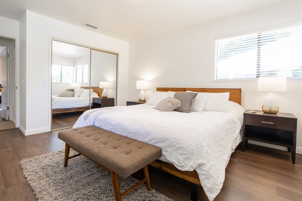 Comfortable king bed with hotel quality linens and a flat screen smart TV to relax and fall asleep after a fun day.