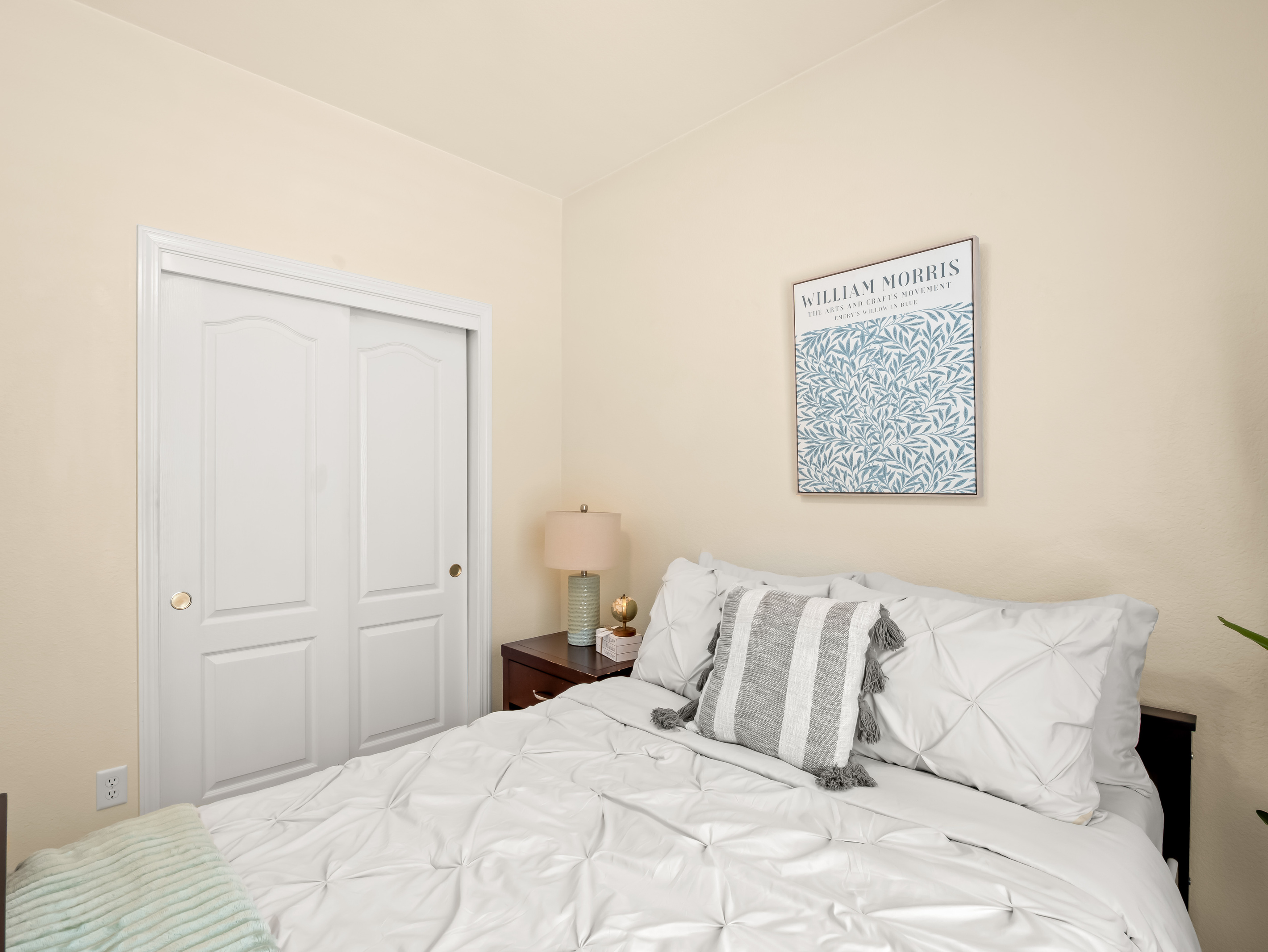 This inviting bedroom is designed for comfort and relaxation, it's a welcoming retreat after a busy day.