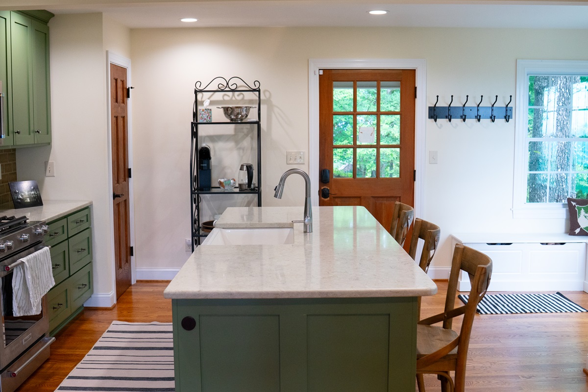 Enjoy plenty of counter space for meal prep or casual dining at the island.