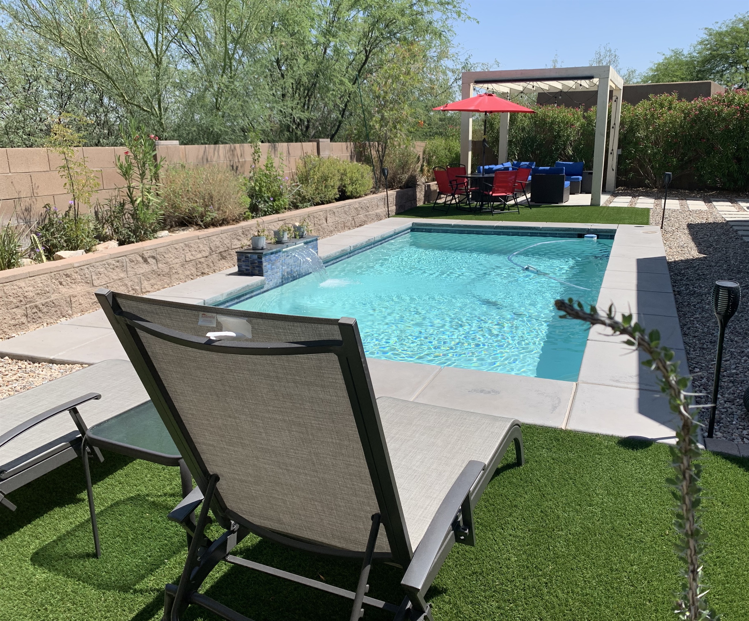 Enjoy the pool and backyard spaces year round. The pool can be heated as needed and there is plenty of both sun and shade.