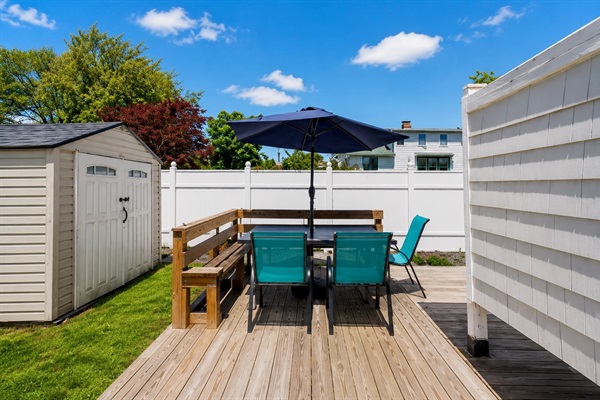 Backyard patio perfect for gathering with family and enjoying the fresh ocean air.