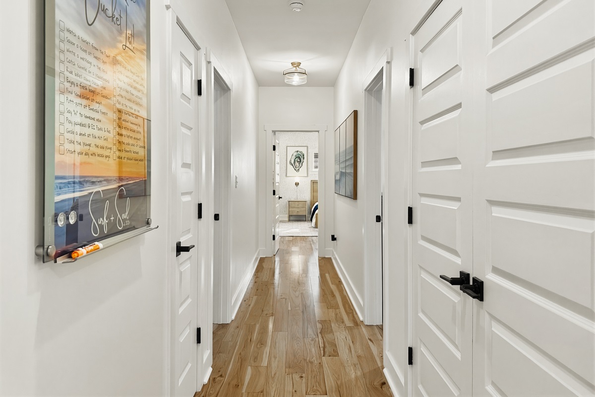The hallway leads you to the 3 upstairs bedrooms.