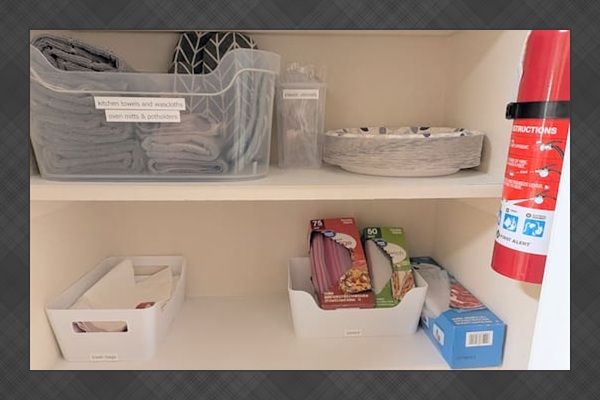 Pantry is stocked with: fire extinguisher and safety kit • extra kitchen towels, oven mitts, and potholders • paper plates and plastic utensils • trash bags • zip lock bags • kitchen trash can