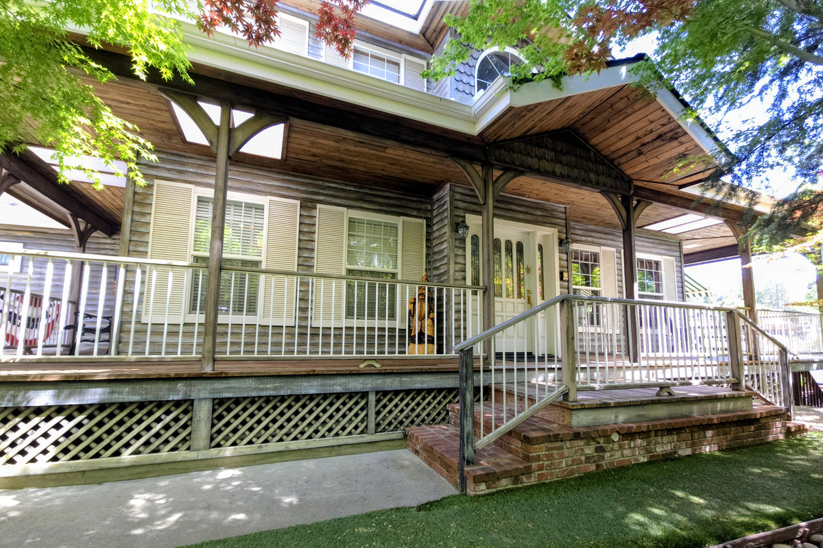 Front door and to the right leads down to the backyard