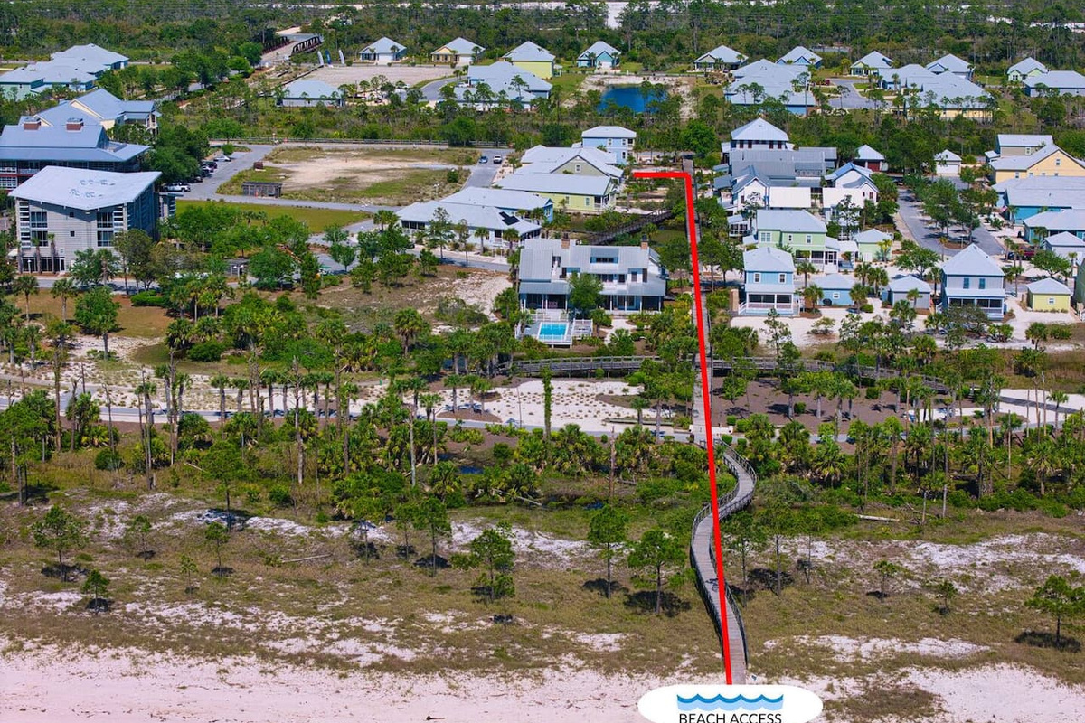 Follow the dedicated boardwalk for a quick and scenic walk to the beautiful white-sand beach