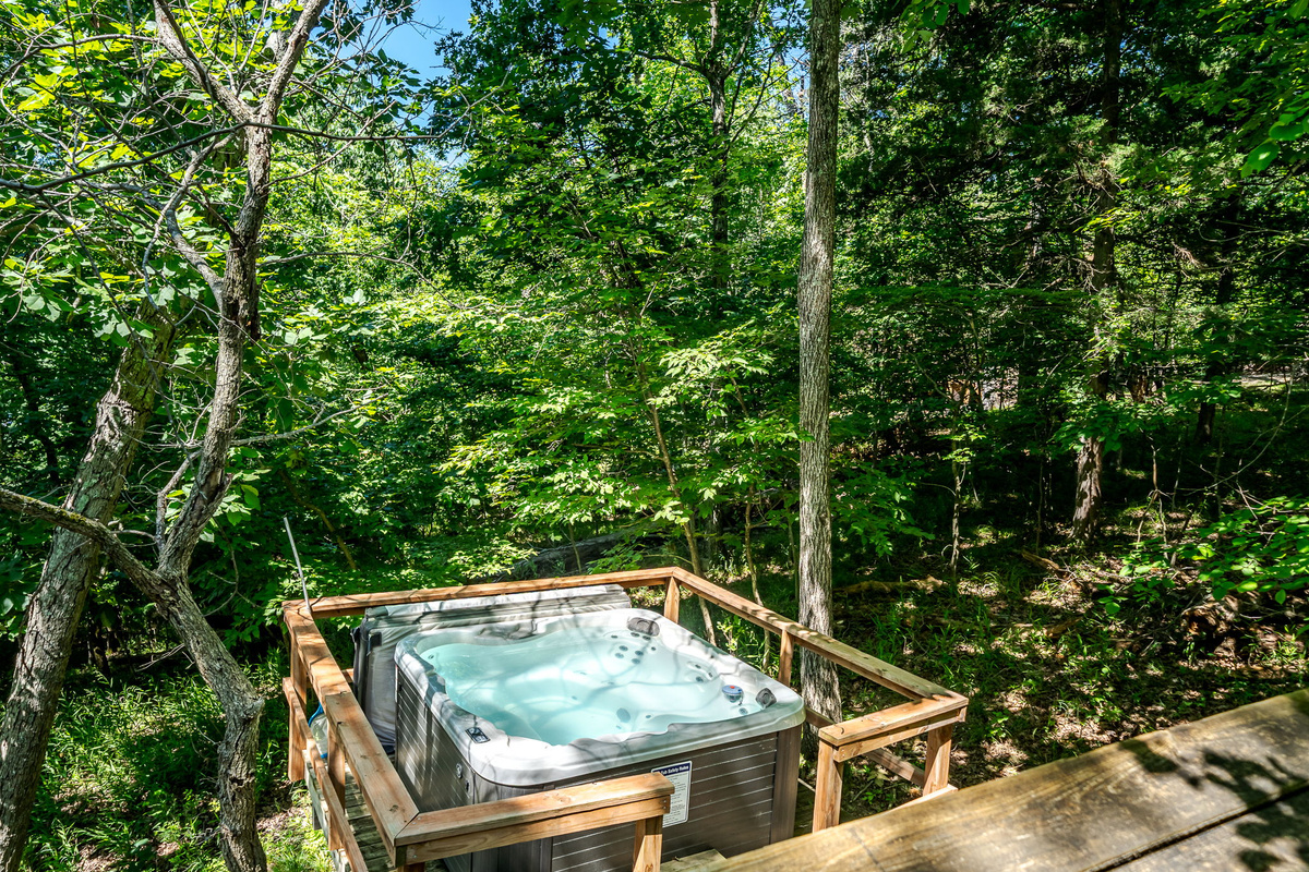 Your hot tub is open year-round — slip in any evening right off the main deck and let the jets do the rest.