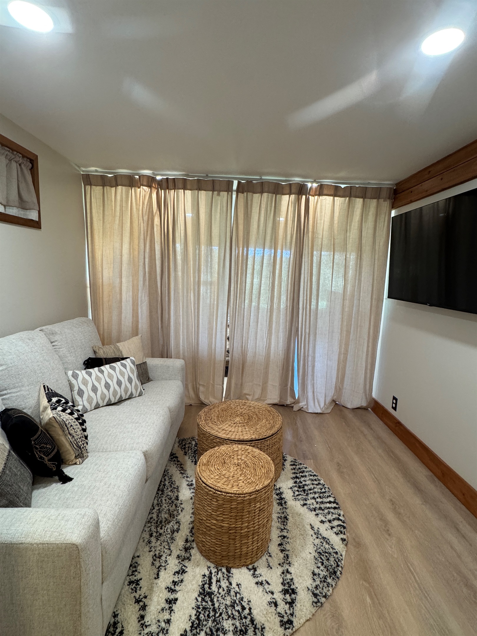 Privacy curtain between lounge area and King bed