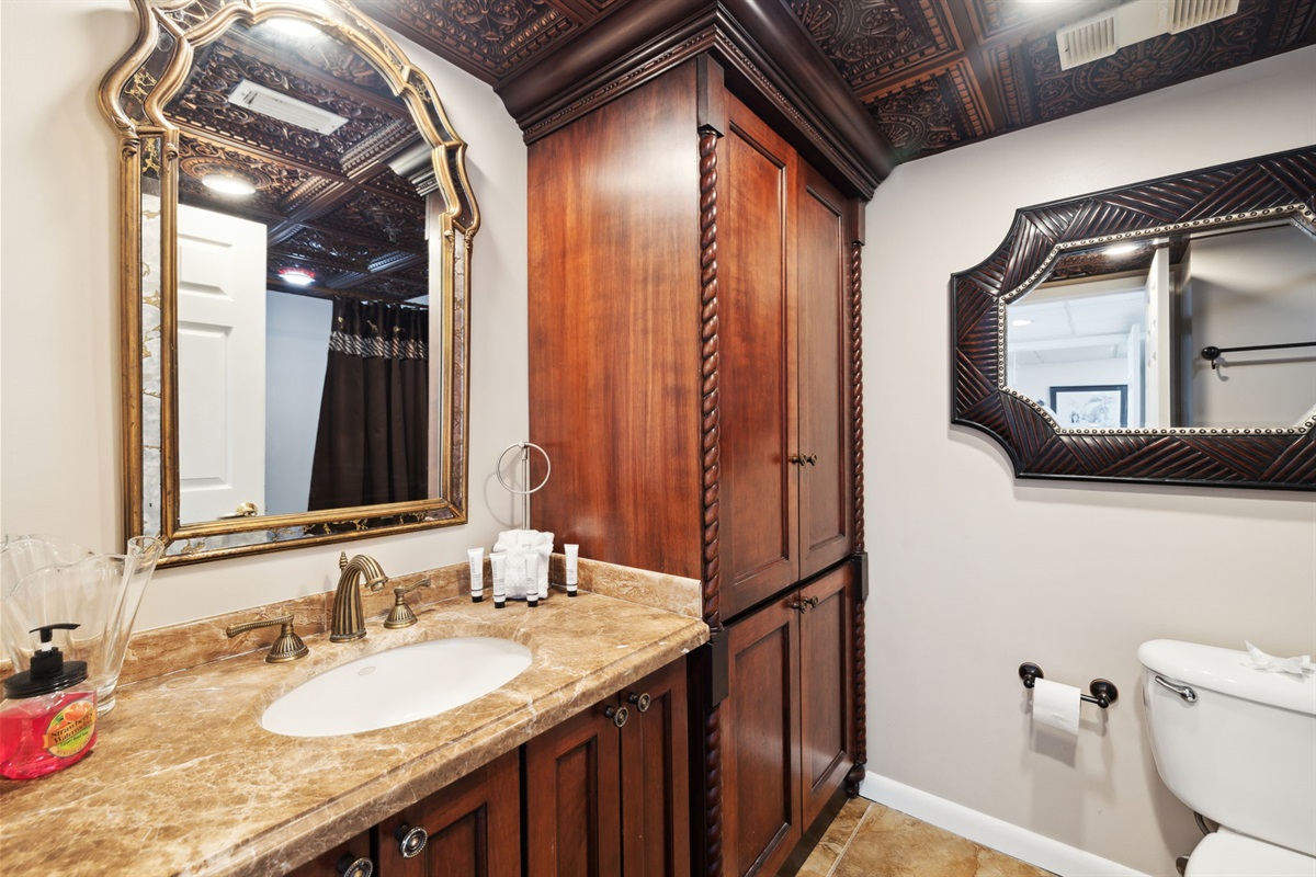 En suite bathroom attached to the double queen bedroom