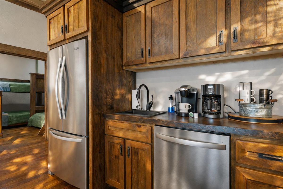 The downstairs kitchenette makes entertaining a breeze, perfect for prepping drinks or quick bites.