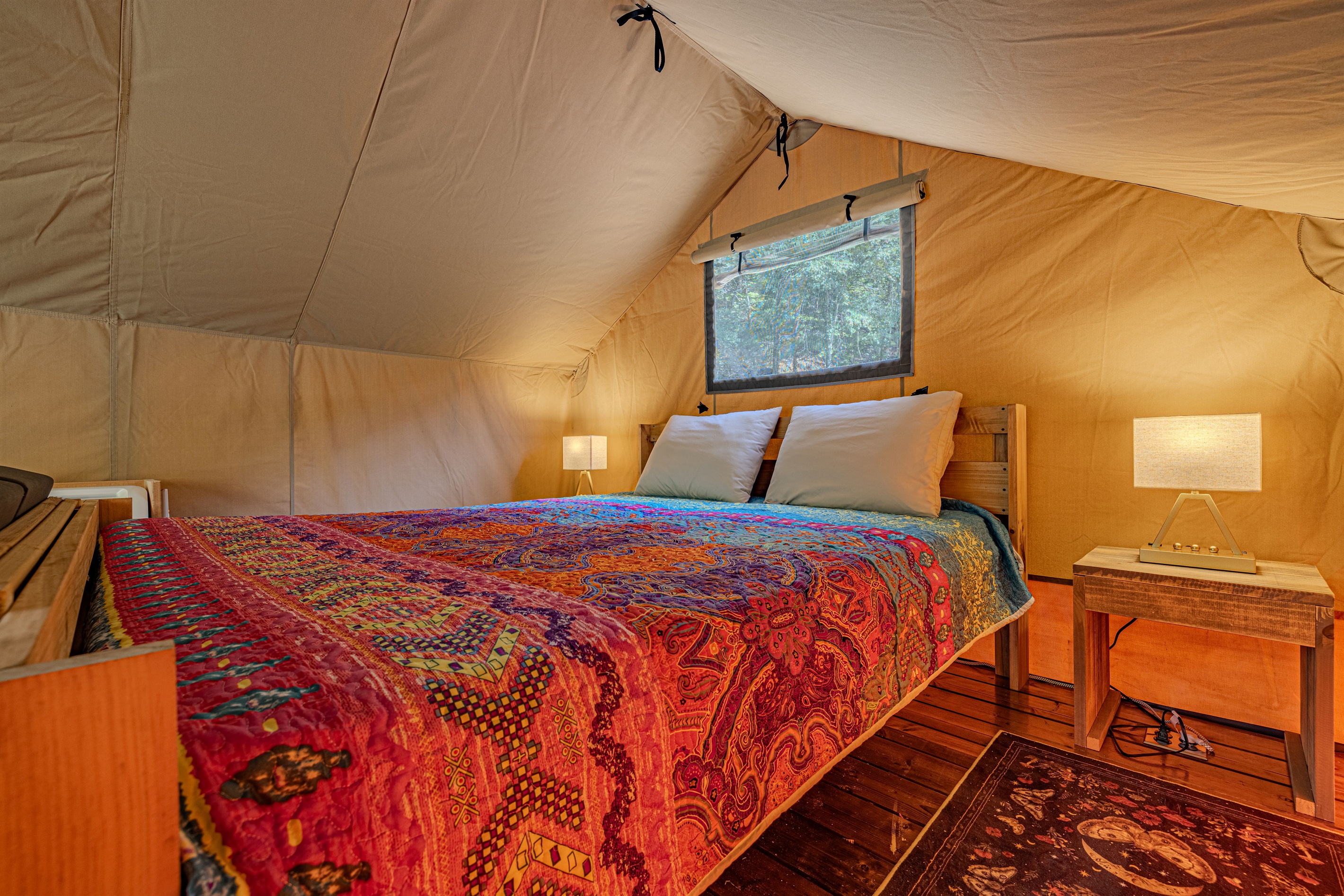 Sleep under canvas, but dream on a cloud. After a day of exploring, sink into your plush queen-sized bed, complete with soft linens and unique, vibrant decor.