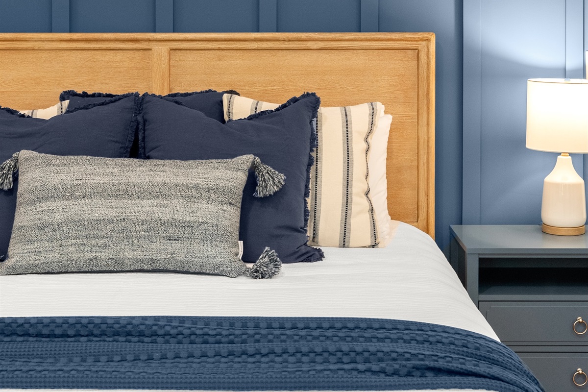 Soft textures and calming tones create a peaceful lakeside escape.