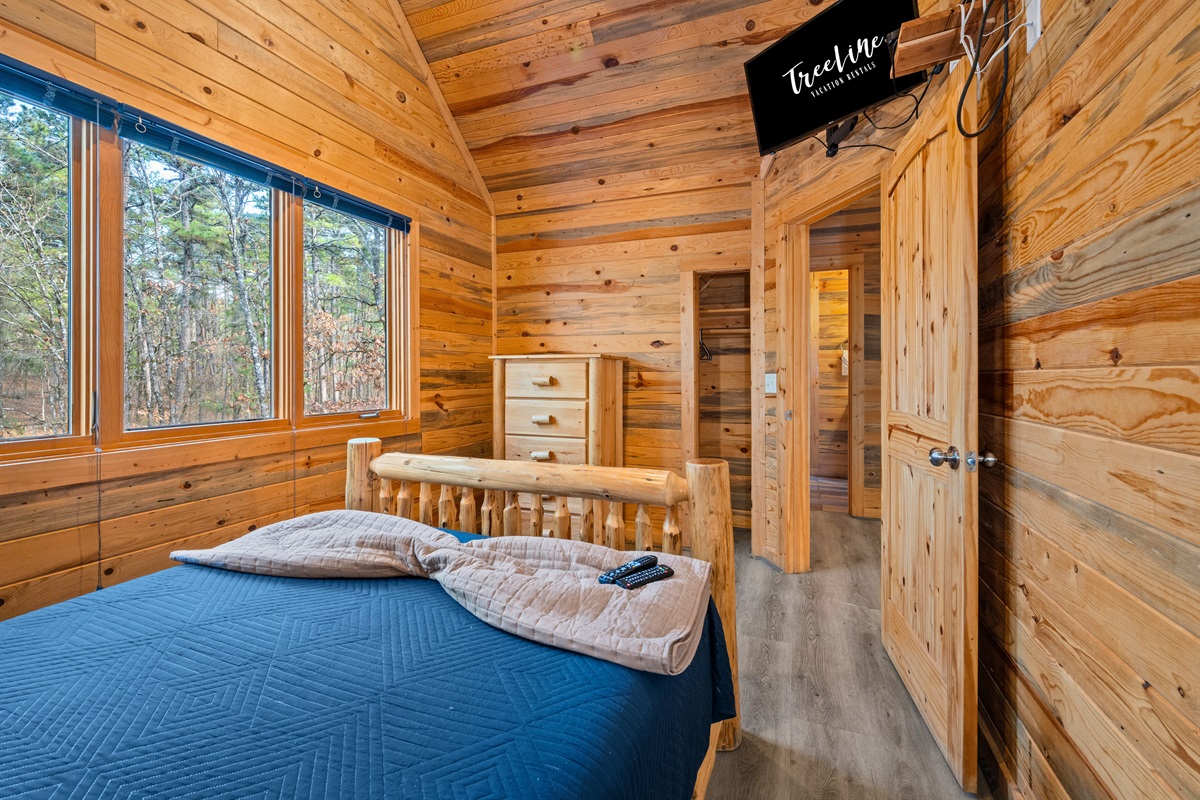 From another angle, the bedroom feels calm and inviting, with thoughtful touches that make it easy to settle in and feel at home.