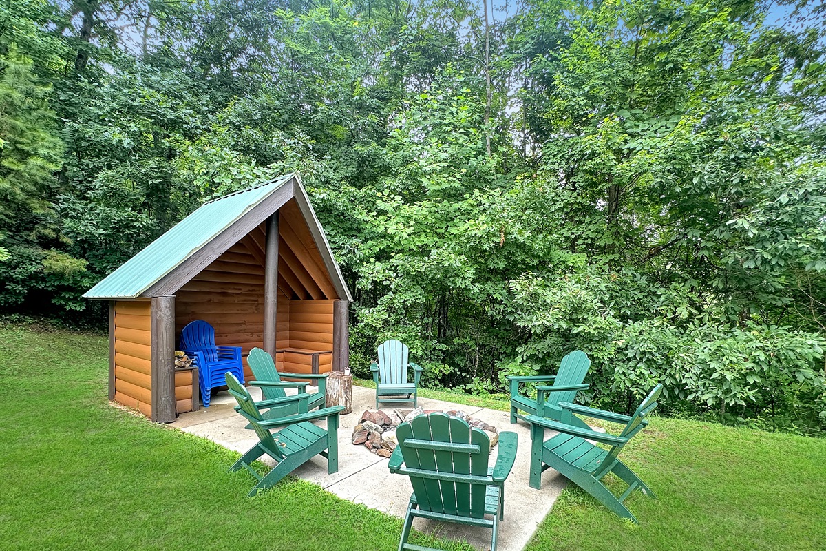 Outdoor: Gather around the fire pit in vibrant chairs, surrounded by nature's beauty!