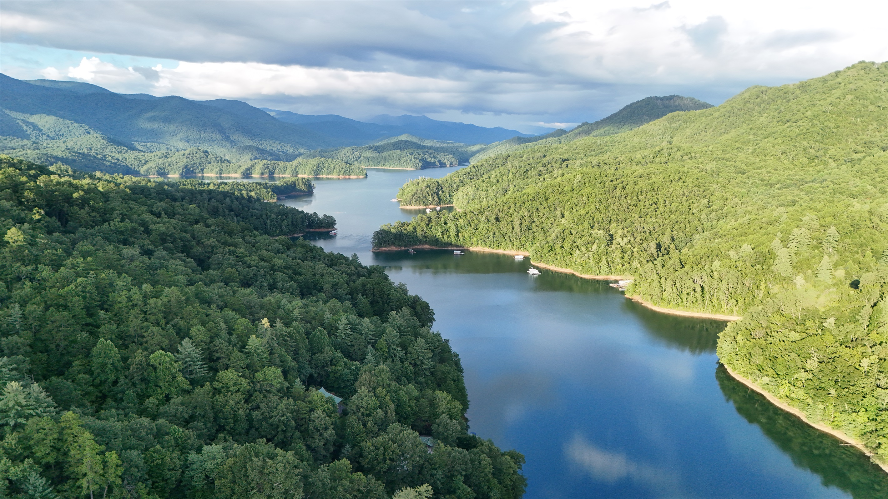 Immerse yourself in lush mountains and serene waters—paradise awaits!