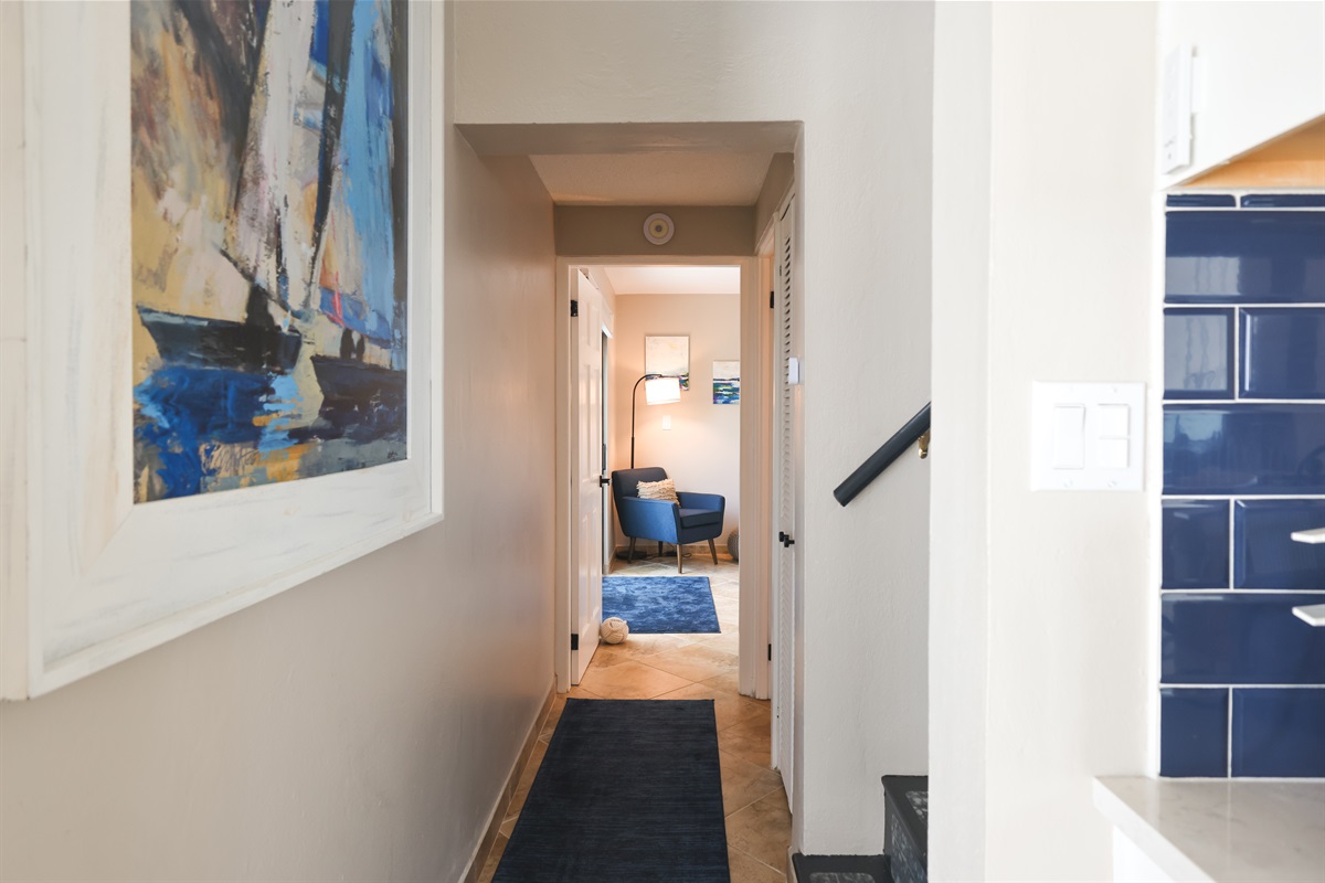 Just down the hall from the kitchen is the primary bedroom.