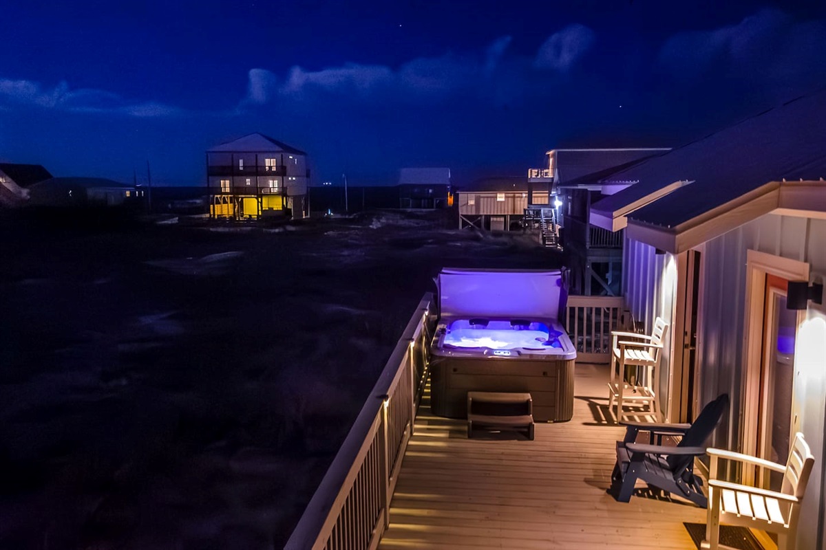 Enjoy the evening in the hot tub on the back porch