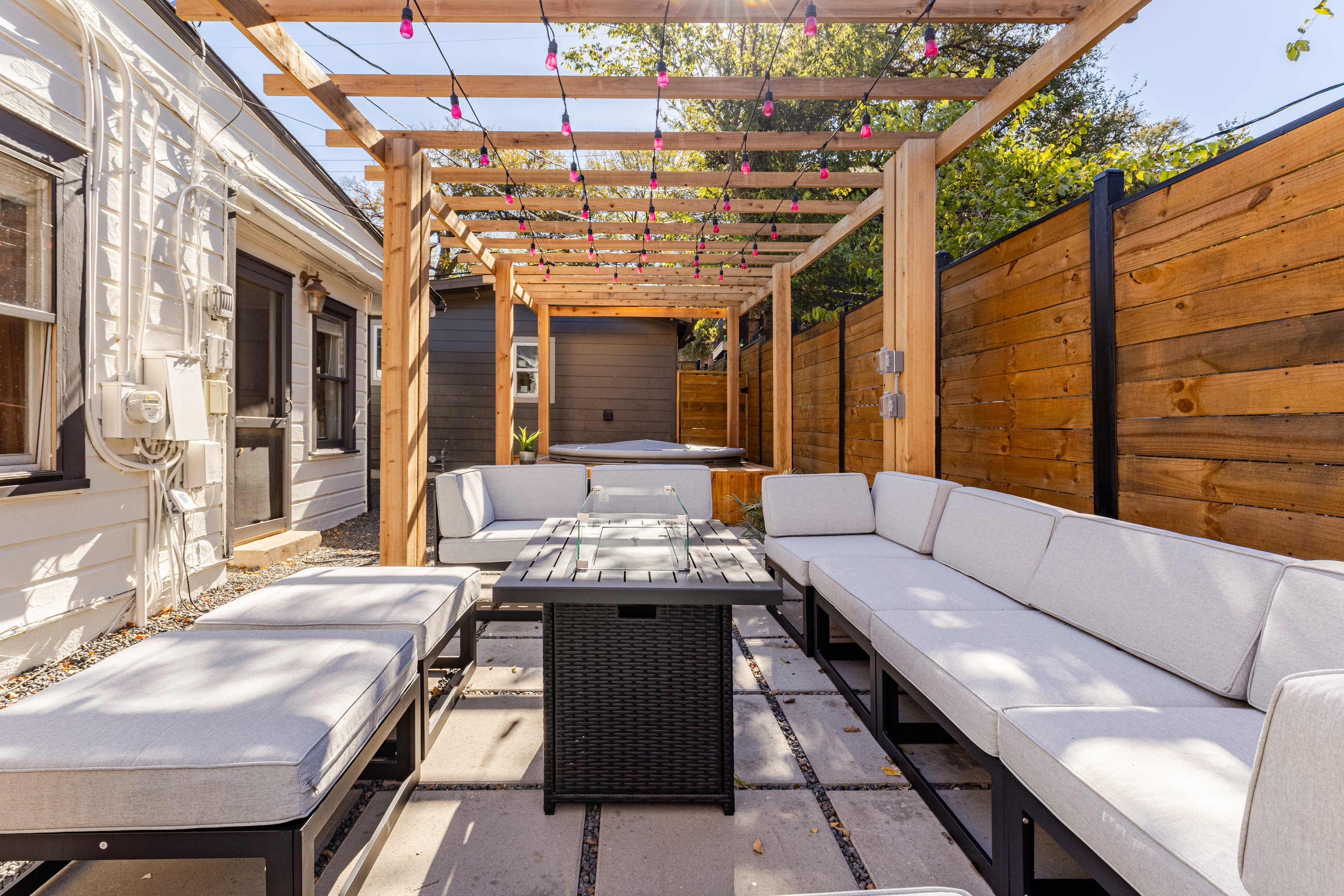 Relax under twinkling lights on this spacious patio perfect for gatherings!