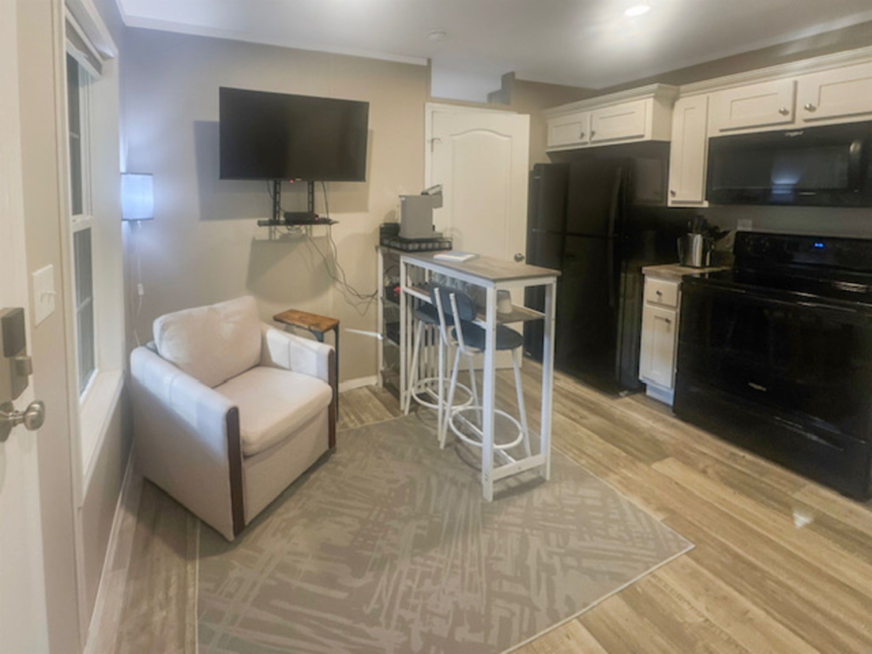 Smart tv with dvd player and dining area in living room