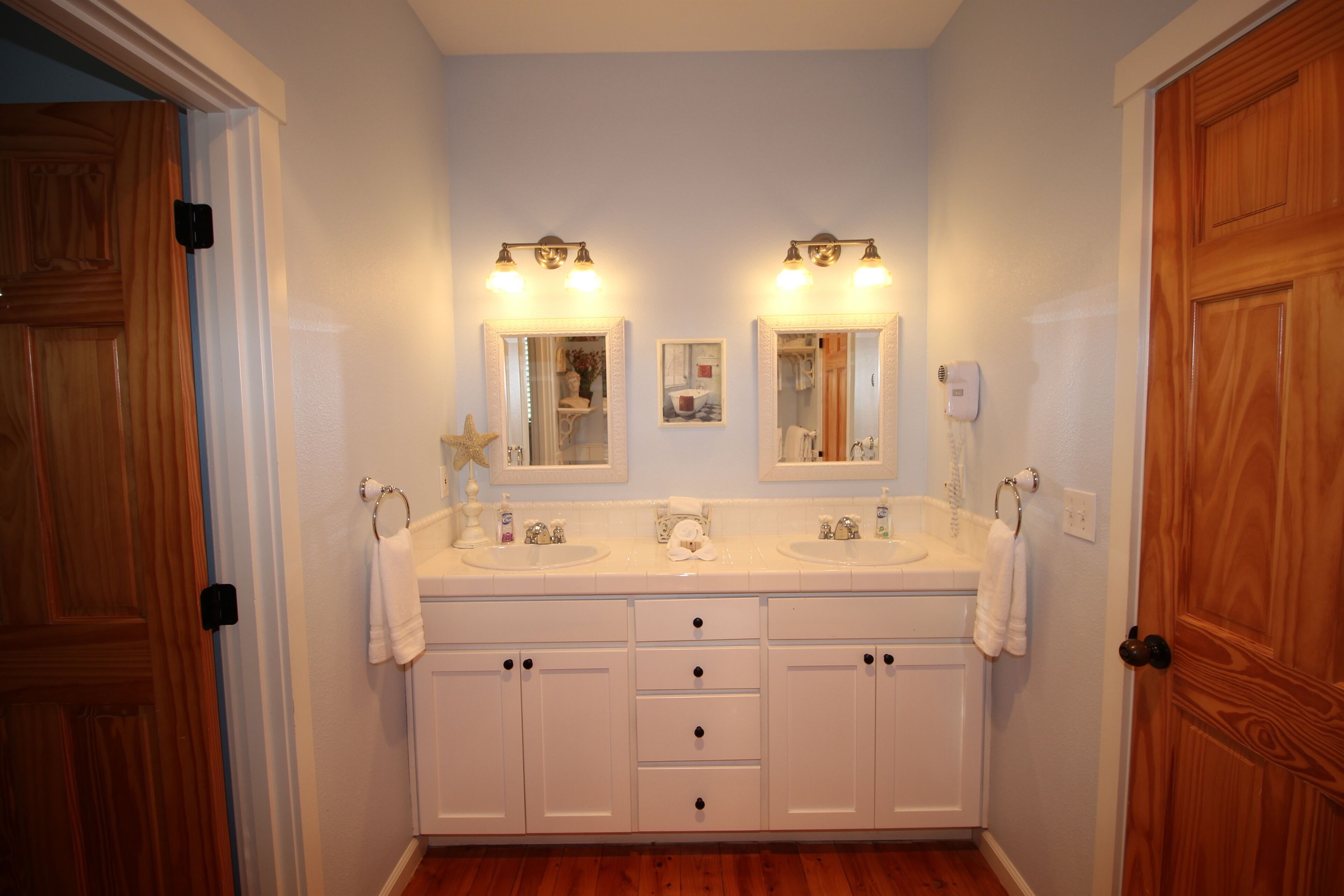 Dual his-and-hers sinks make getting beach-ready a breeze.