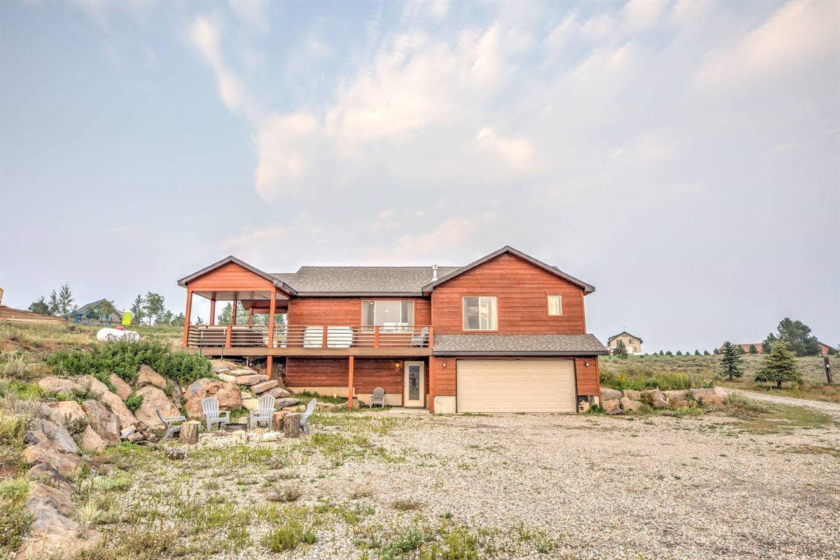 West side of cabin, Garage & Walk out basement Entrance