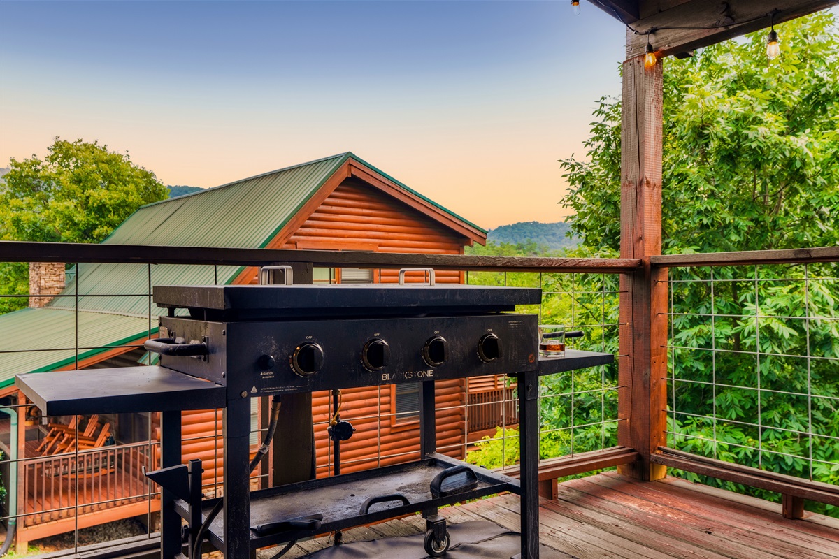 Main floor deck offers a Blackstone grill