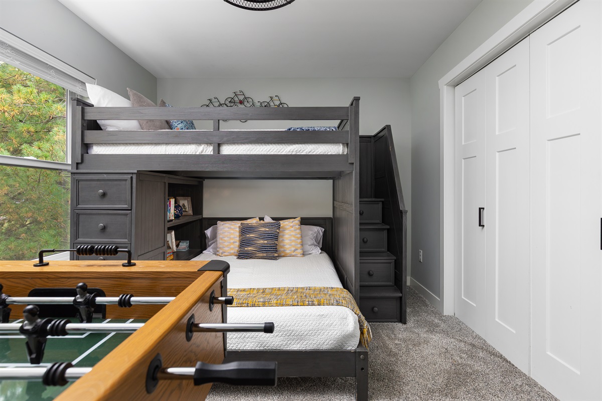 Second bedroom, upstairs with full/full bunk bed, foosball