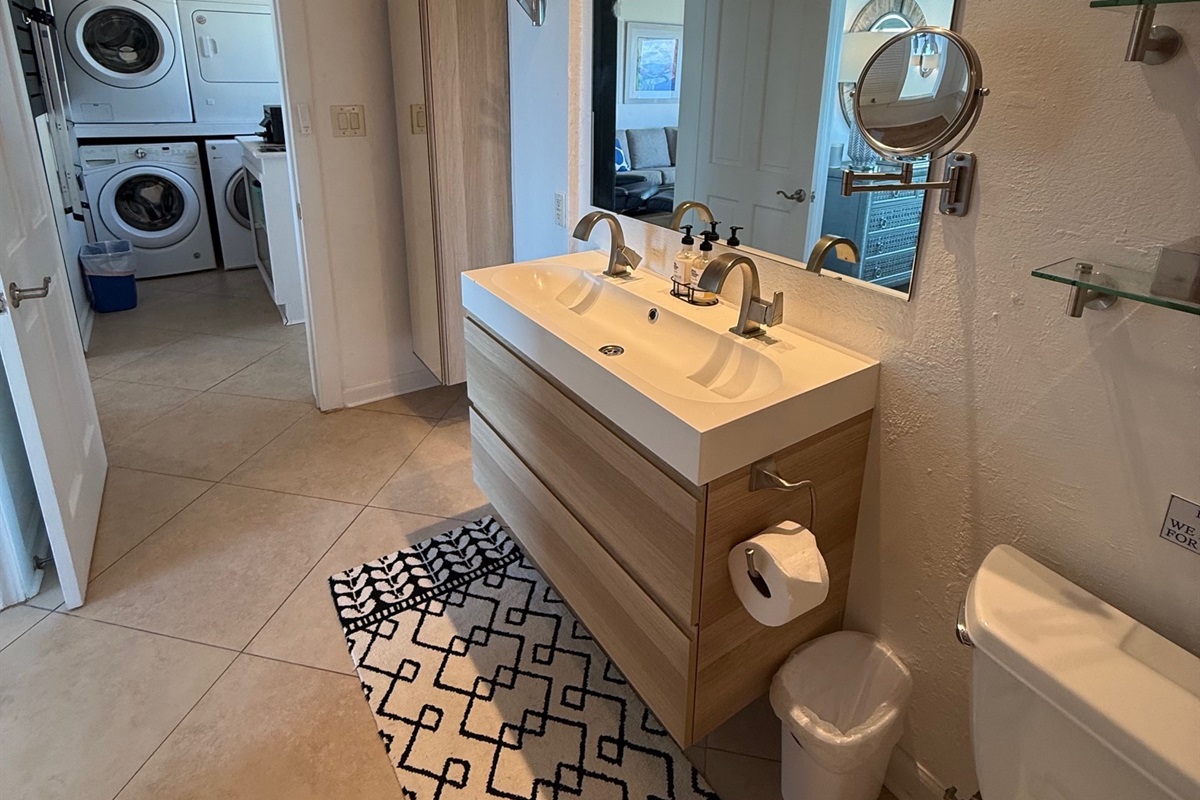 The ensuite leads to the laundry room, but you can close this door to insure your privacy.