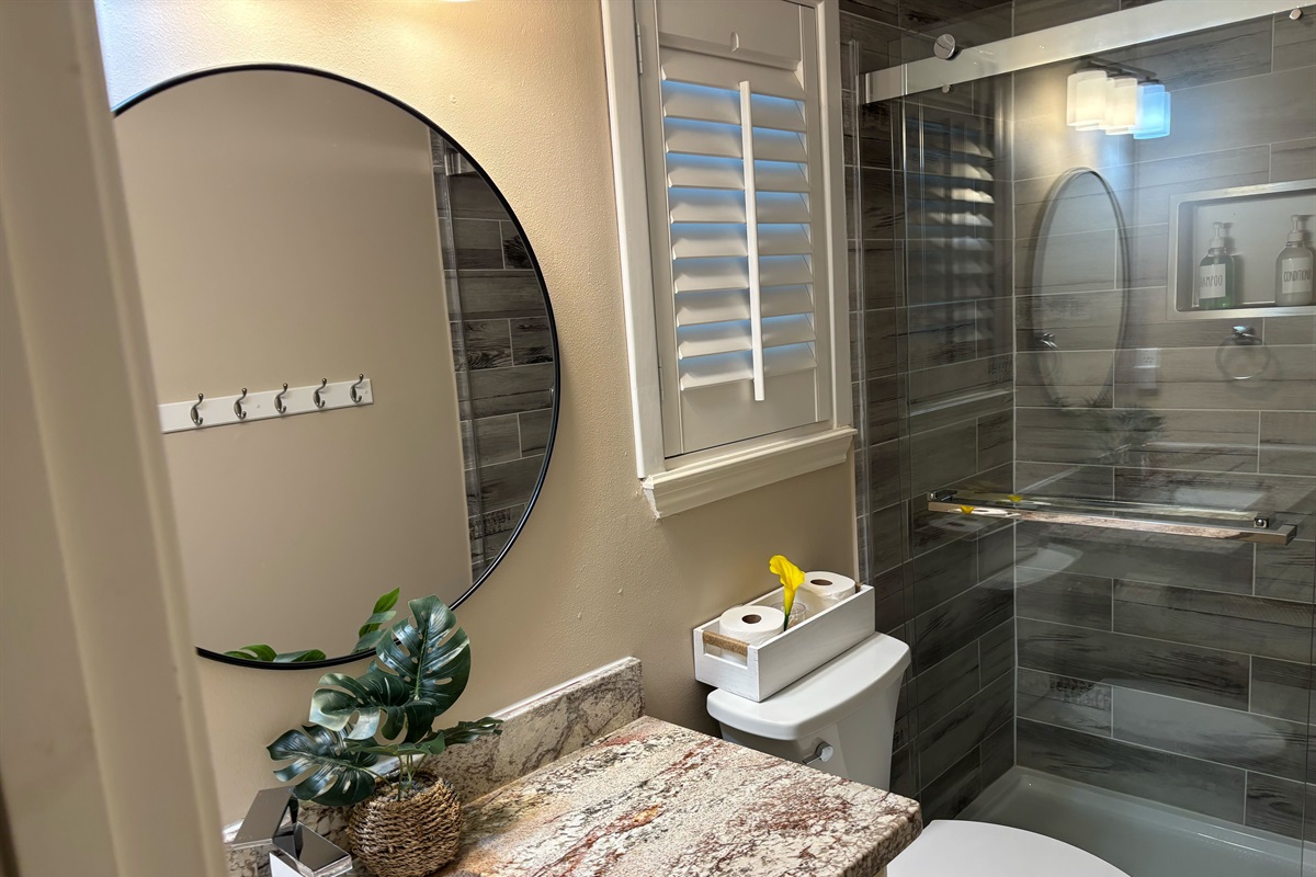 Freshen up in style in the spotless walk-in shower of our second bathroom.