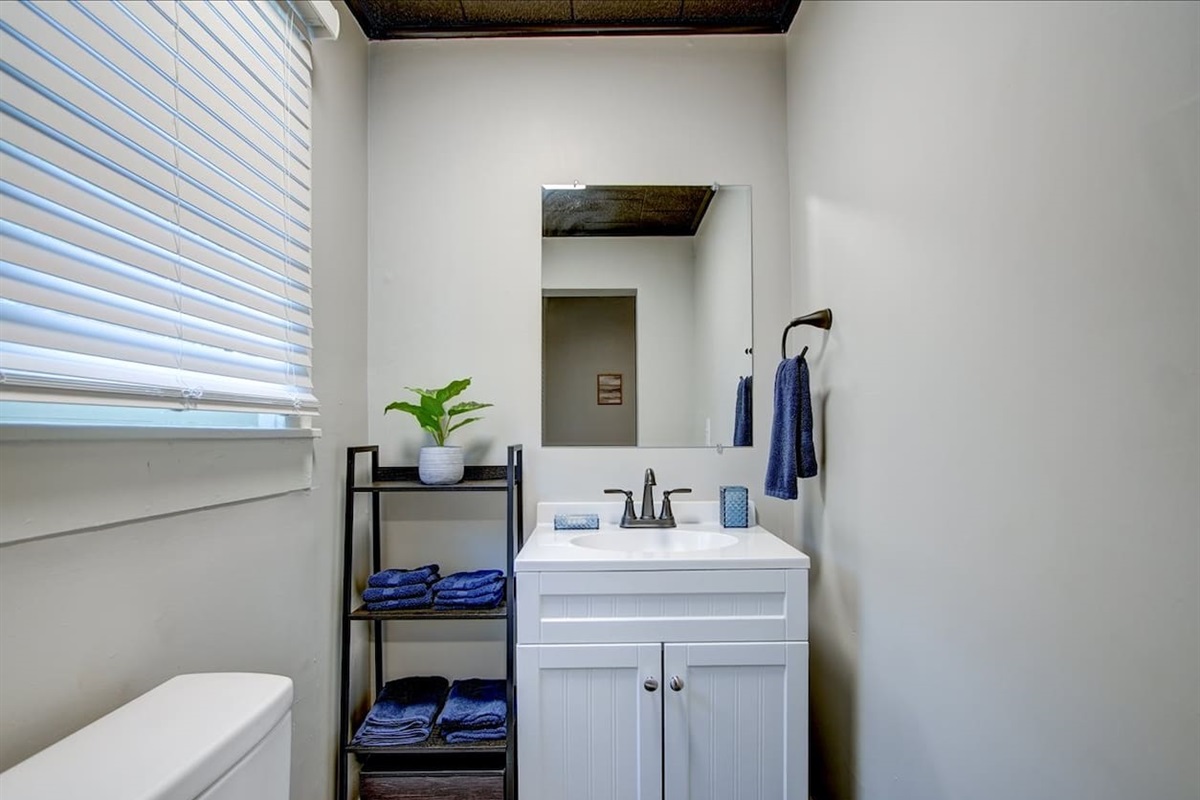 half bath attached to twin bedroom