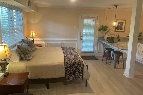The lower primary suite has it's own over sized sitting area, kitchenette, mini fridge with freezer, full sized laundry units free for guests, walk in closet, and large bath and shower area.