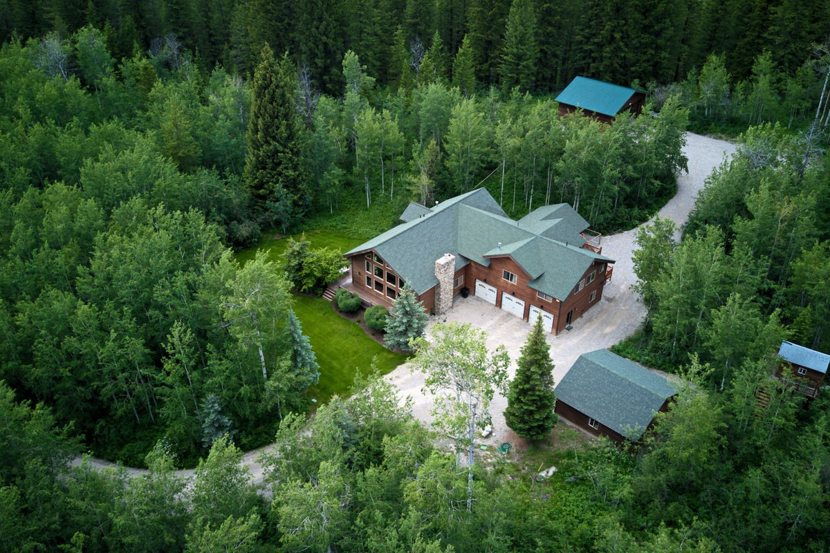 Aerial photo of 3.4-acre property. Green shed is part of property.