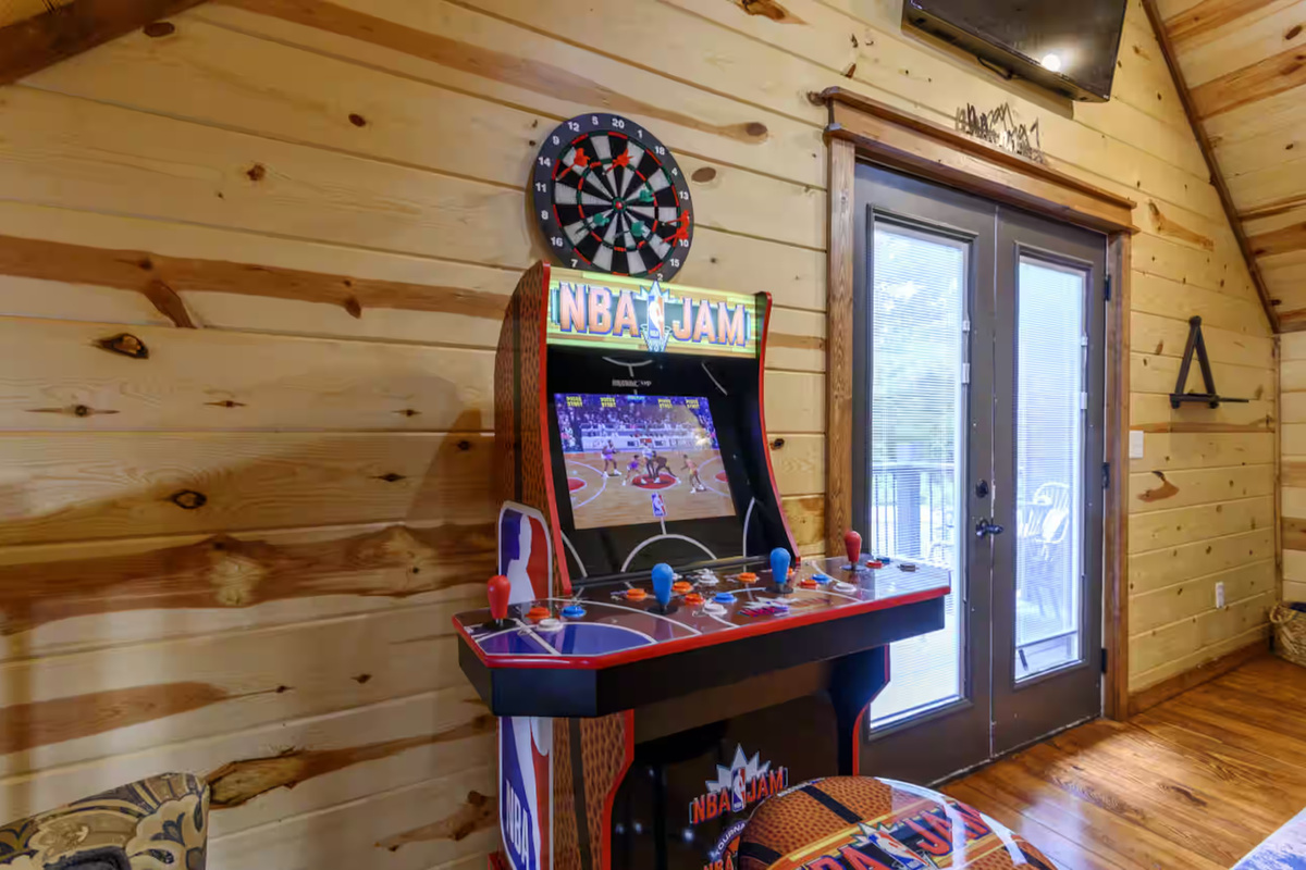 Game Room: Unleash your inner champion with arcade fun and dart challenges!