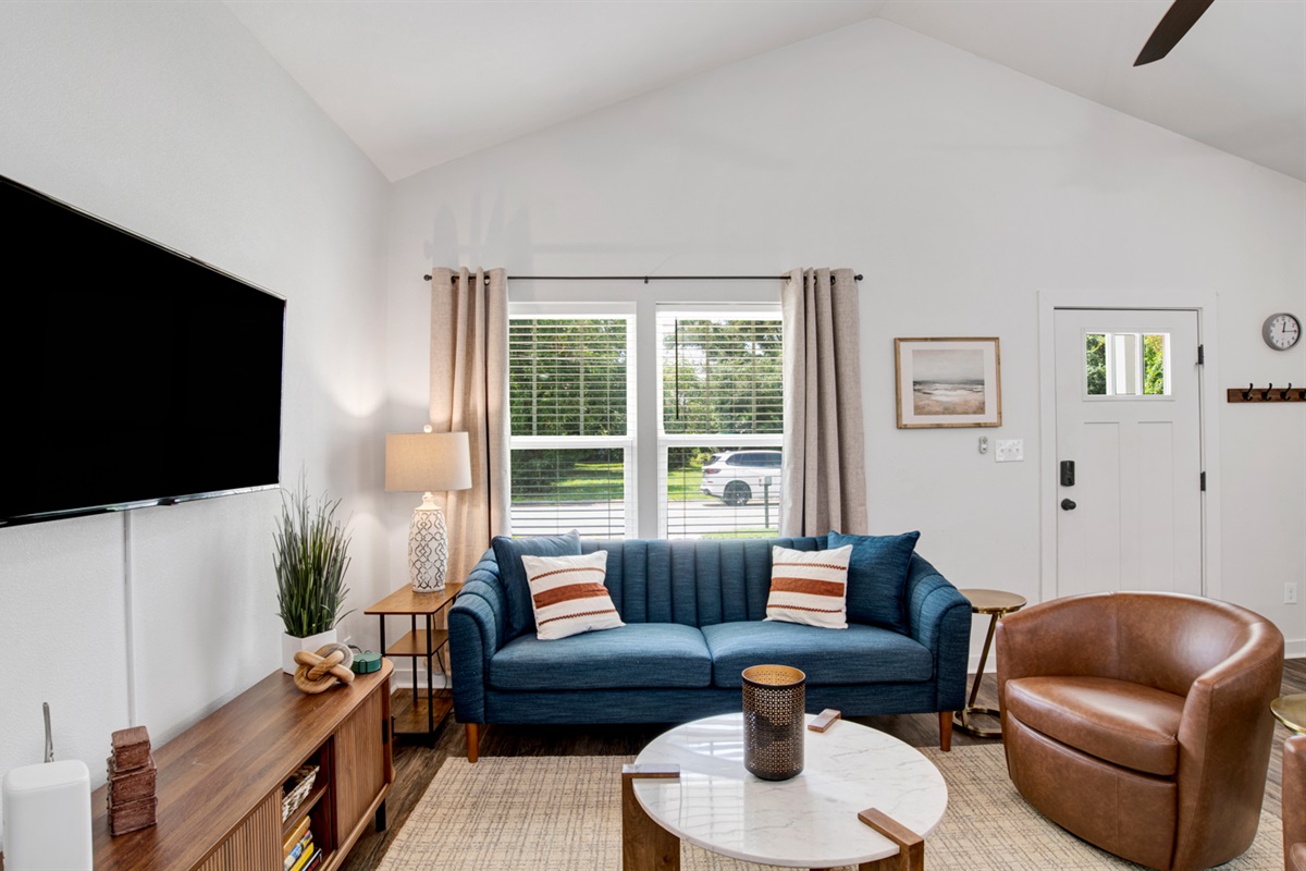 The open living area invites laughter, conversation and cozy evenings in.