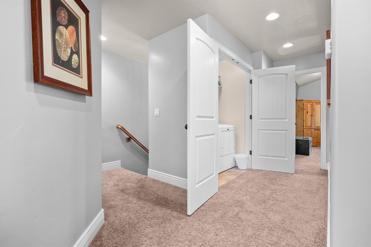 Come upstairs to access the bedrooms and laundry.