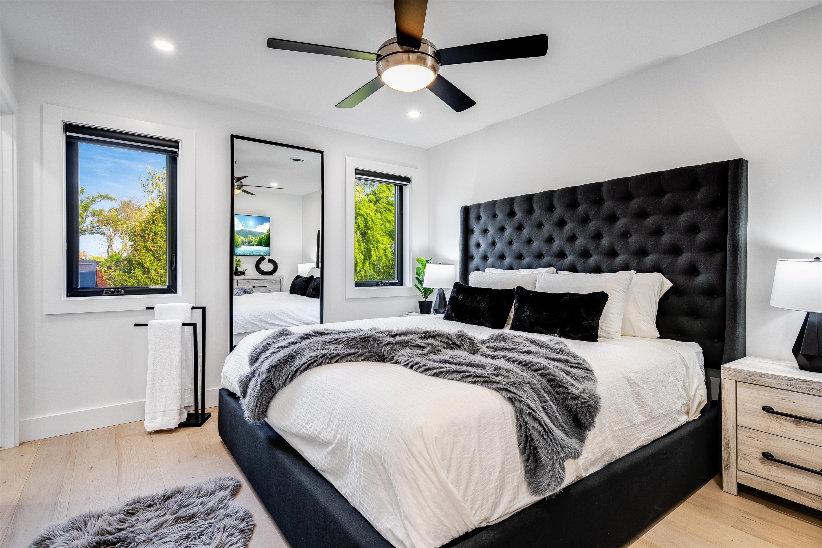 King Bedroom with Harmonious balance of warm, dark, and light tones.