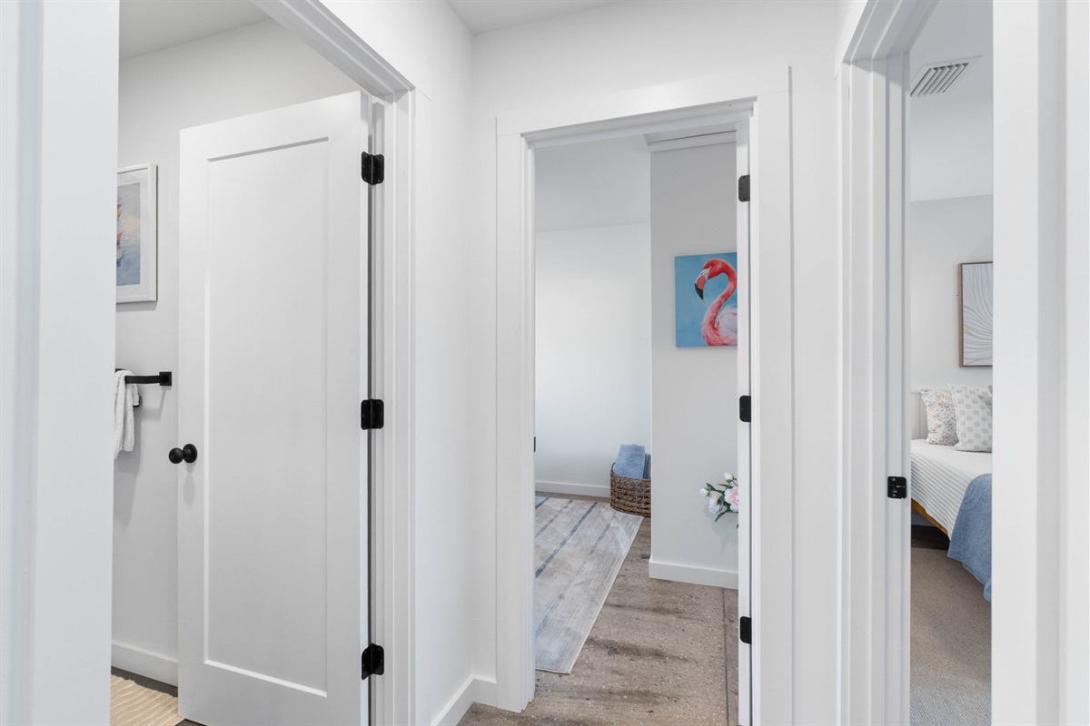 Hallway separating the two bedrooms and the hallway bathroom