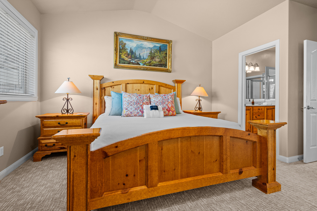 Peaceful primary retreat designed for restful nights after skiing, hiking, or boating.