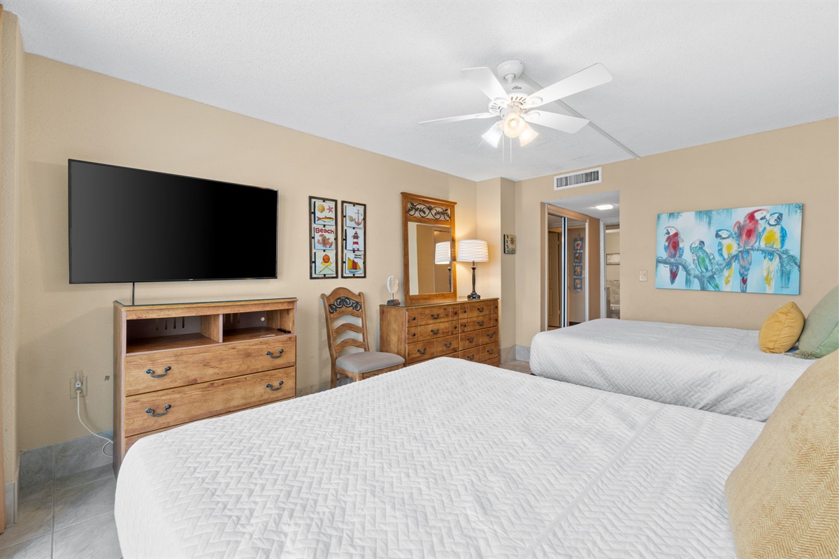 Bedroom 2 with 2 Queen Beds, Balcony Access, and Beach Views