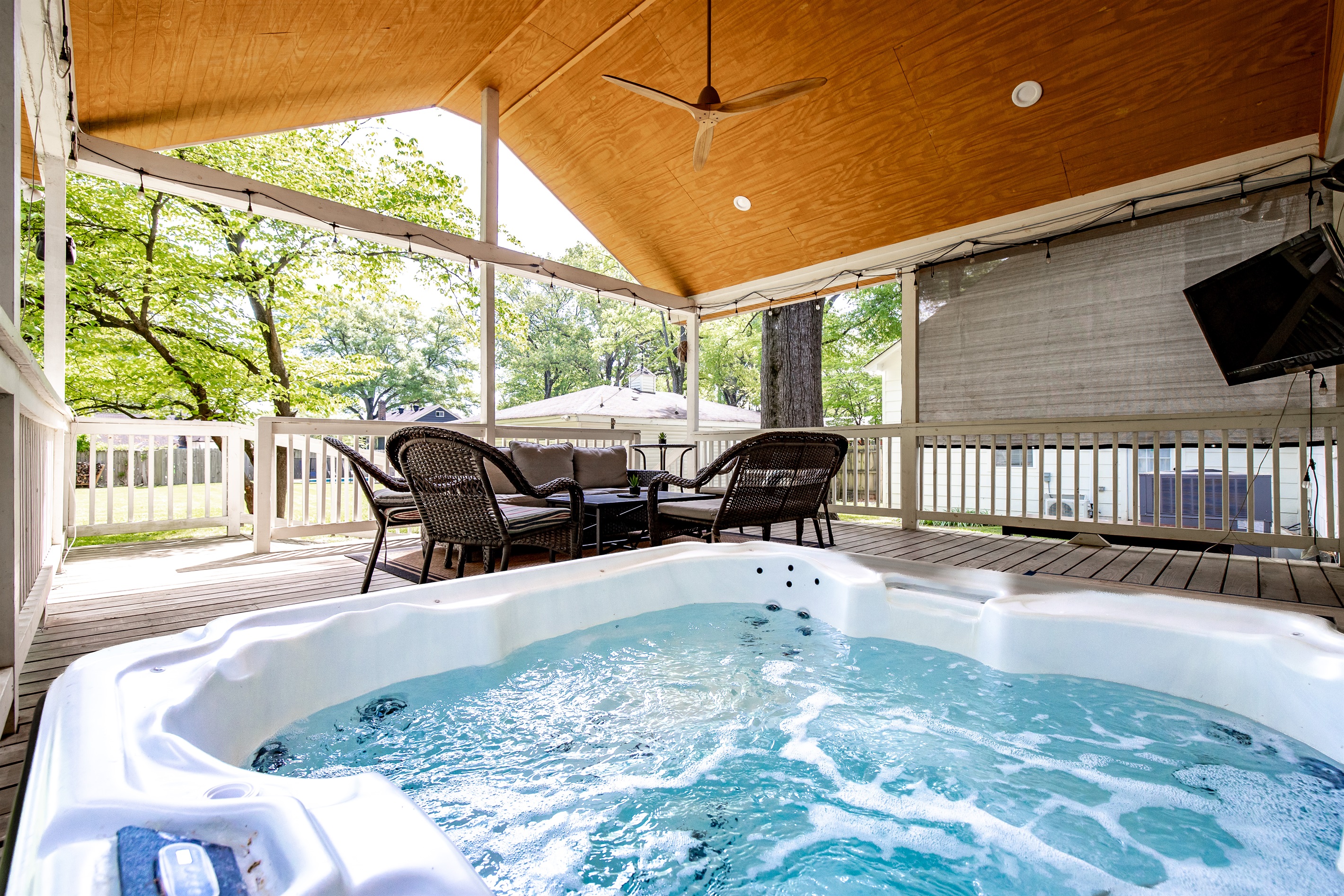 Covered deck with hot tub