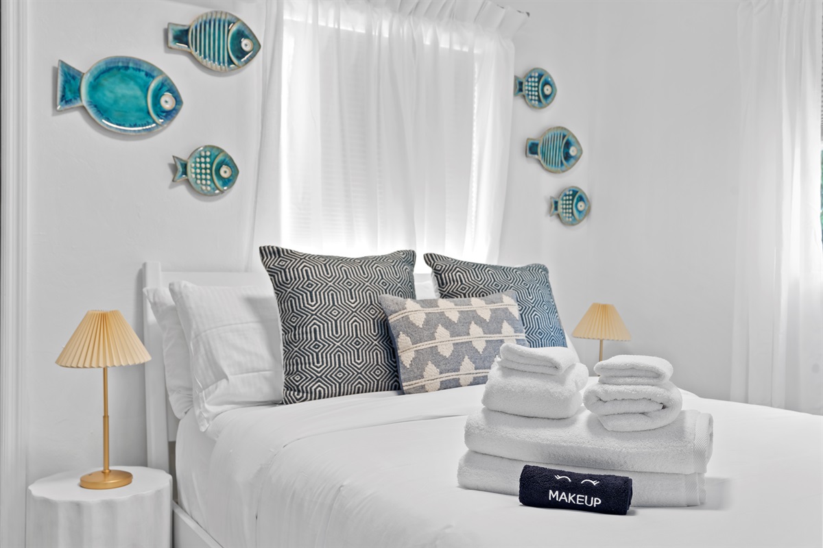 Soft linens and ocean-inspired accents invite you to relax in total comfort.