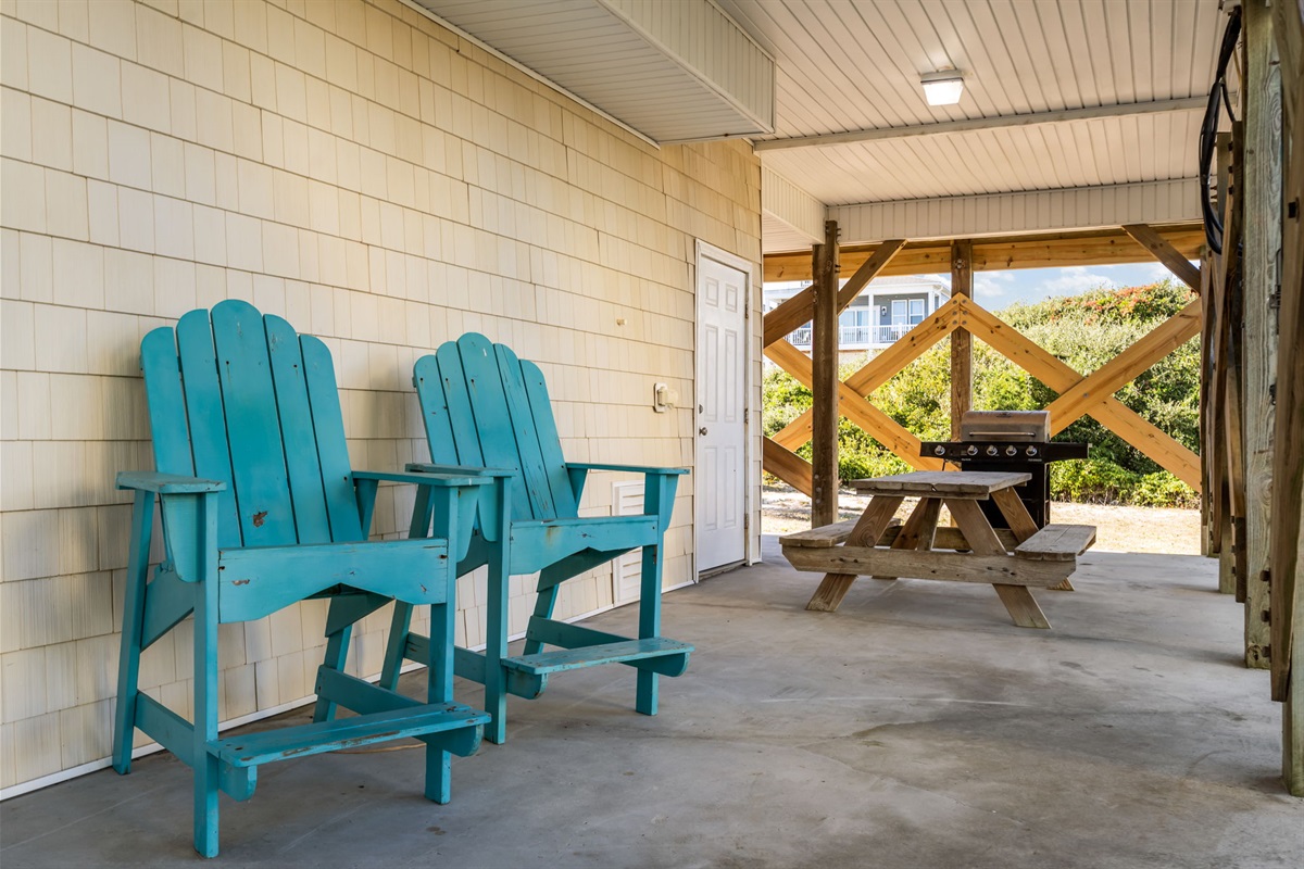 Fire up the fun! This outdoor features a propane grill and picnic table, perfect for relaxed meals.