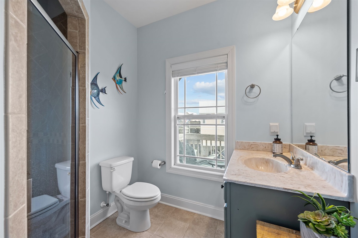 3rd full bathrom on the top level off of the main living space