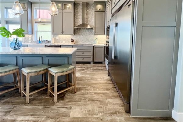 Crystal Paradise Kitchen: Bright, open kitchen featuring luxurious marble surfaces and generous space for gatherings.