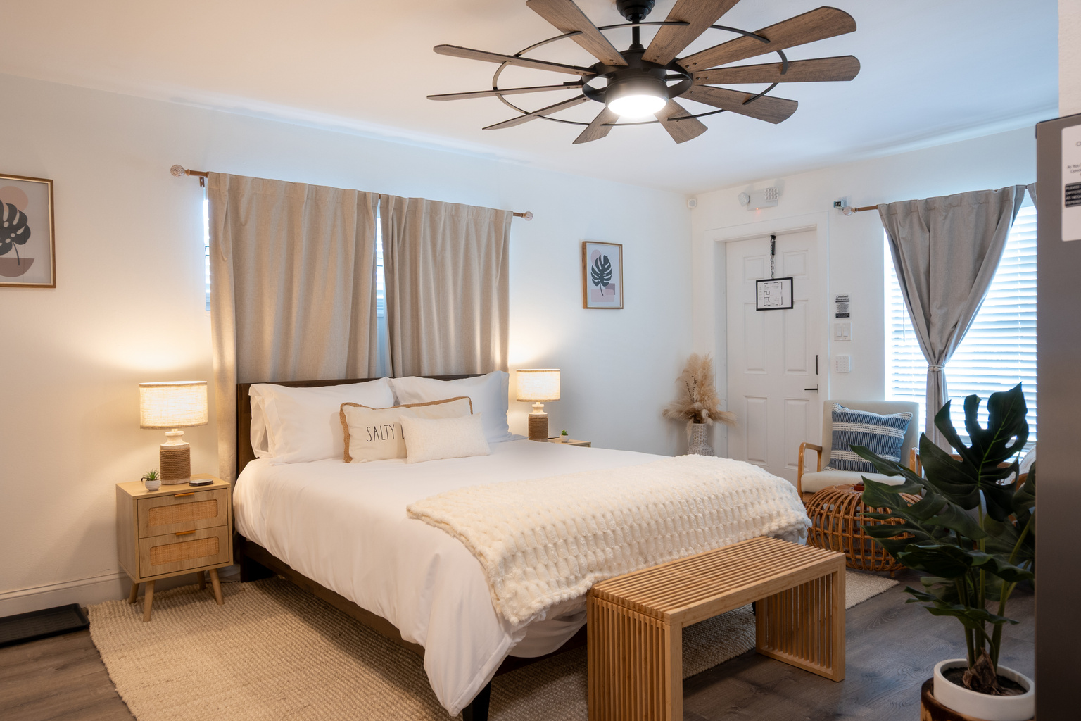 Crisp hotel-quality linens and a ceiling fan for cool coastal nights