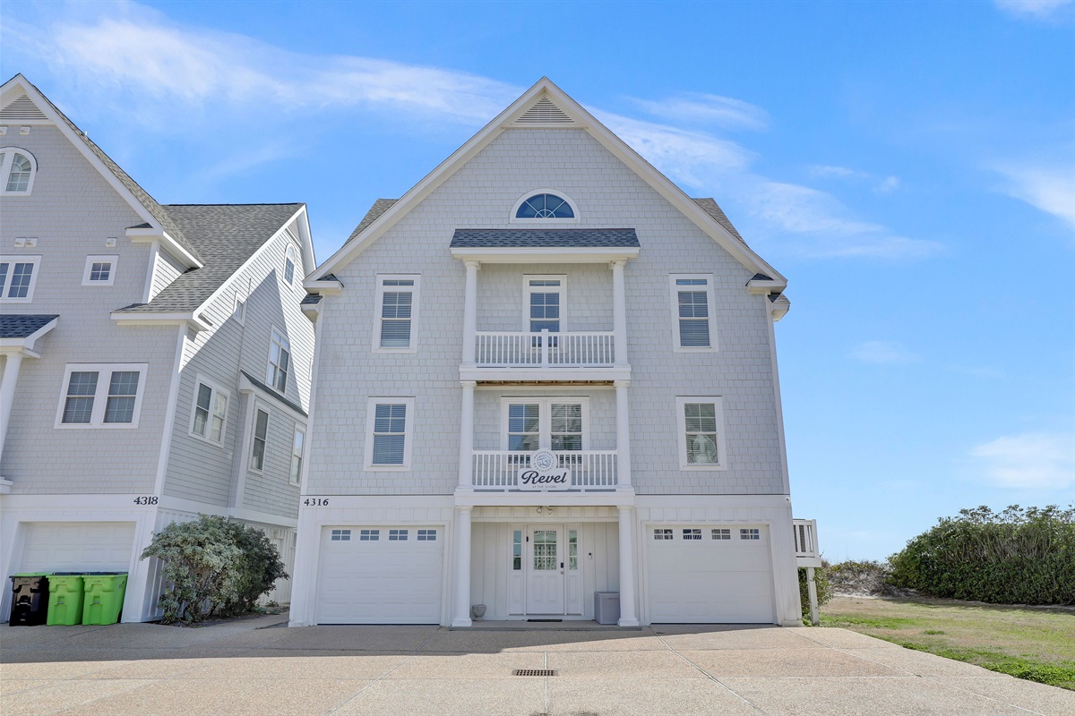 A grand entrance to your brand-new oceanfront getaway on New River Inlet Rd.