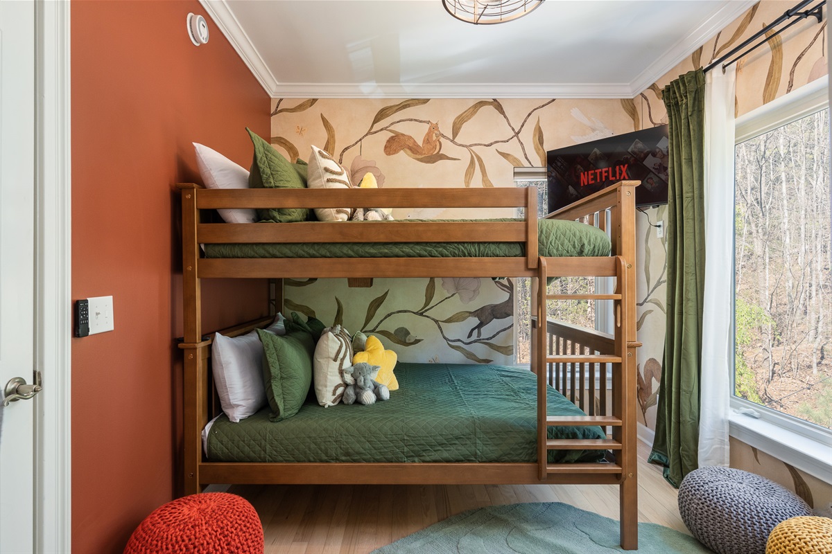 Additional bunk room with natural light and soft finishes - comfortable and thoughtfully styled