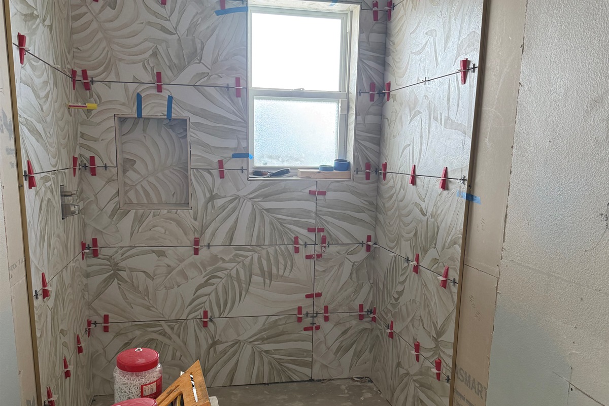 A half bath is being converted to a full bathroom 