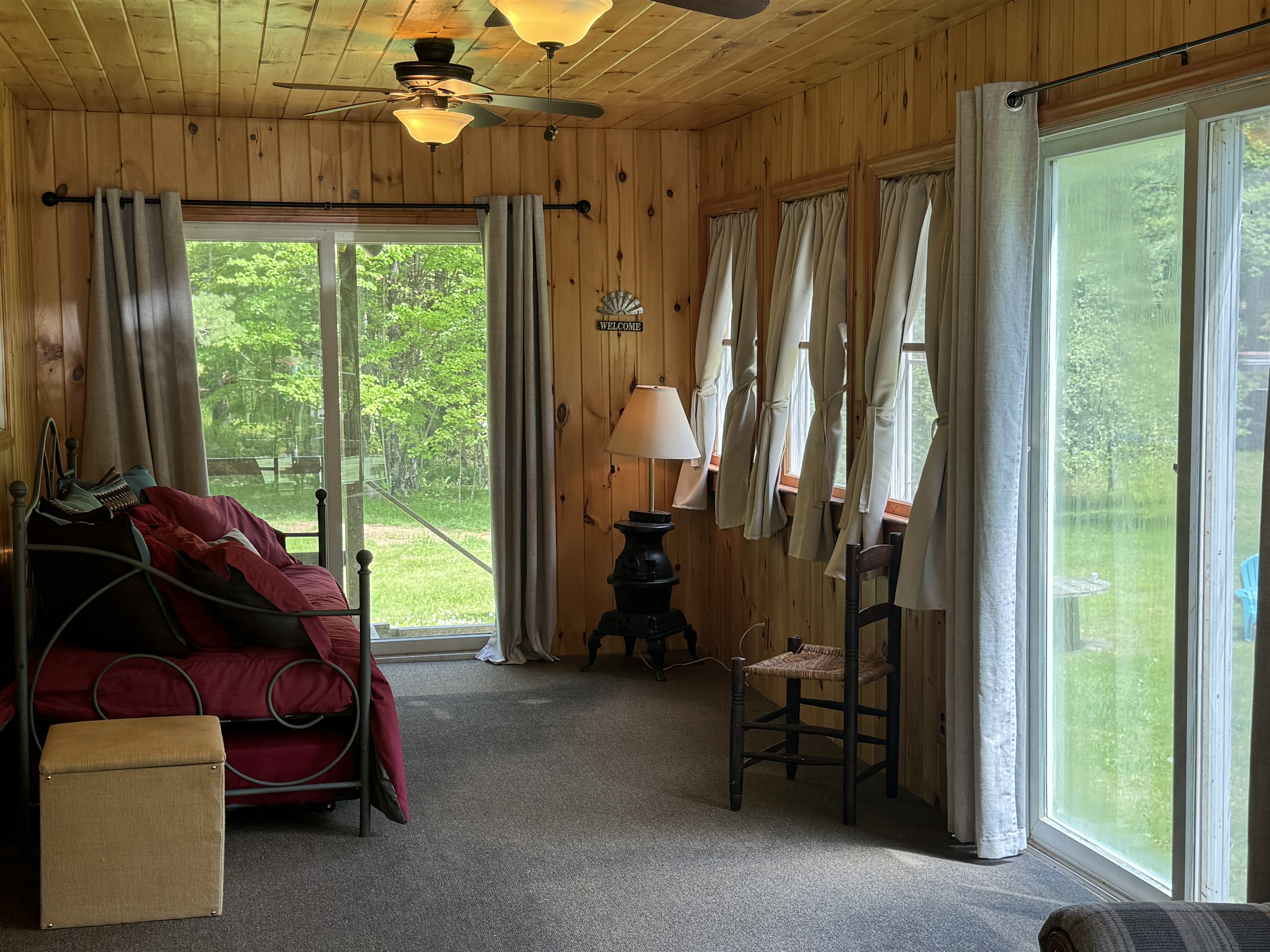 Sunroom with backyard beyond