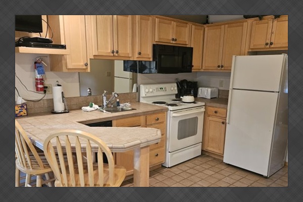 Breakfast nook next to kitchen.